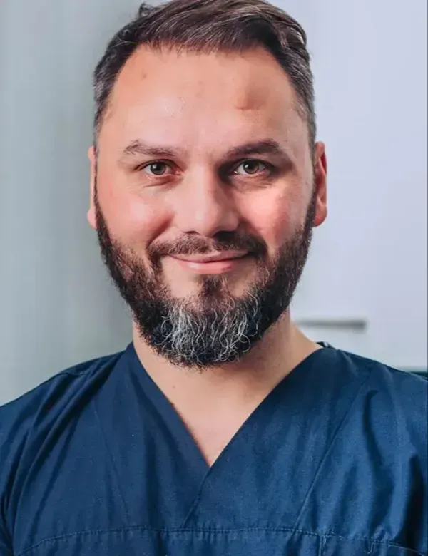 Dt. Ertan Omerov implant and gum dentist Istanbul
